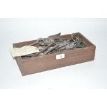 A wooden tray and contents of Vintage secateurs, s