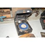 A Decca Crescendo portable gramophone with un-asso