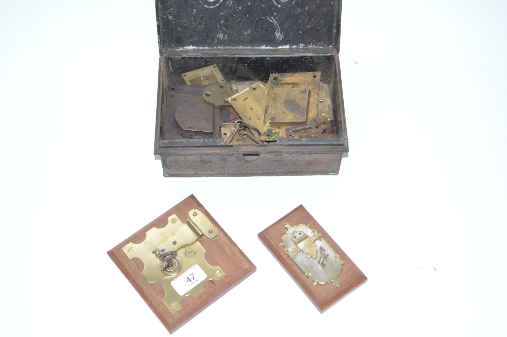 A tin box containing Vintage trunk locks and two e - Image 2 of 2