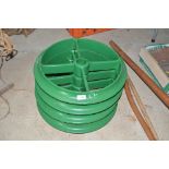 A set of four green painted shepherd hut wheels