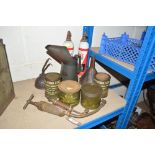 Two grease guns; an oil can; metal funnel and Nato