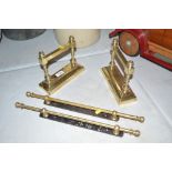 A pair of Victorian brass implement rests and a pa