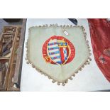 A Pembroke College needlework banner