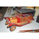 A wooden model of a Vintage car