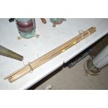 A set of brass stair rods