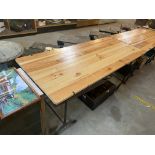 A pine trestle table with period cast iron supports