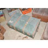 A green canvas and battened travelling trunk