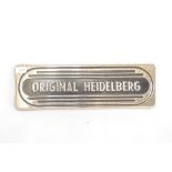 A chrome and enamel plaque, "Original Heidelberg",