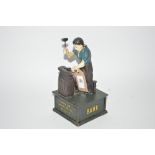 A novelty cast iron John Deere moneybox