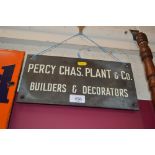 A brass business plaque for "Percy Chas. Plant & C