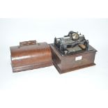 An Edison phonograph in polished oak case, comple