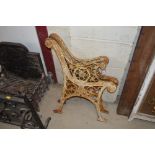 A pair of cast iron bench ends