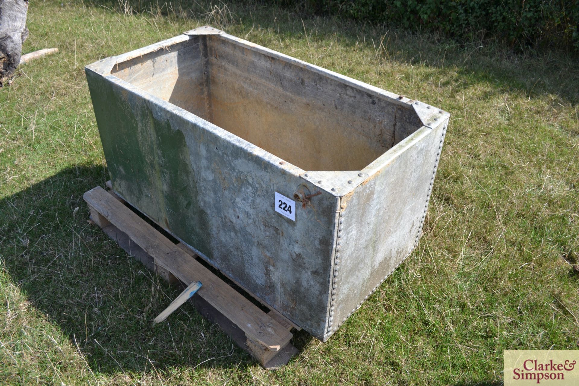 A riveted galvanised tank.