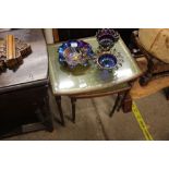 Two mahogany and glass topped occasional tables