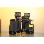 A pair of Prismatic 8 x 30 binoculars