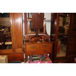 An Edwardian mahogany dressing chest fitted two sh