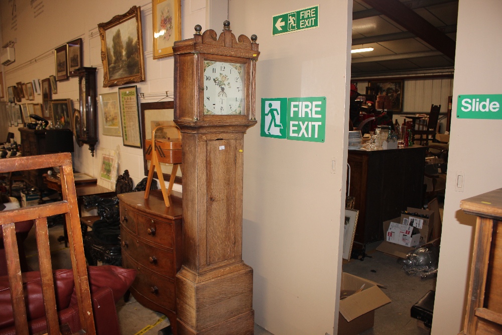 A 19th Century oak long case clock with painted di