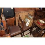 A set of four Ercol dining chairs