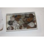A tray of various coins to include some silver wit