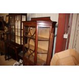 An Edwardian mahogany and inlaid glazed display ca