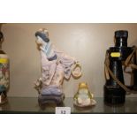 A Lladro frog; and a Lladro Geisha girl