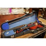 A Stentor Music Co. violin and bow in carrying cas