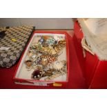 A tray of mostly costume brooches