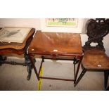 An oriental style mahogany side table