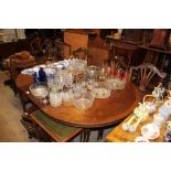 A reproduction mahogany D end dining table with a