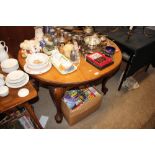 A mahogany circular topped dining table