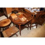 An Edwardian octagonal topped two tier table