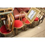 A set of four bentwood gilt decorated chairs