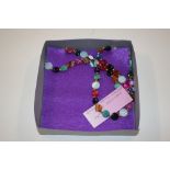 A multi coloured agate necklace