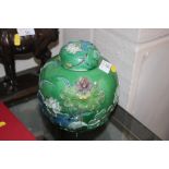 An oriental floral decorated ginger jar and cover