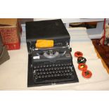 An Imperial typewriter in carrying case