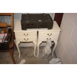 A pair of French style bedside tables, each fitted