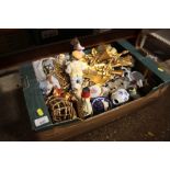 A box of decorative ornaments and china items