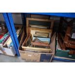 A box of mostly picture frames