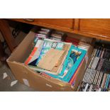 A box of various tapes, music books etc.