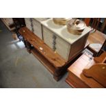 A pine two tier coffee table