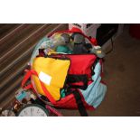 A bag containing various wet suits; flippers etc
