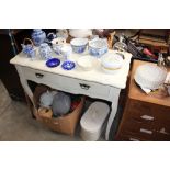 A white painted side table fitted two drawers