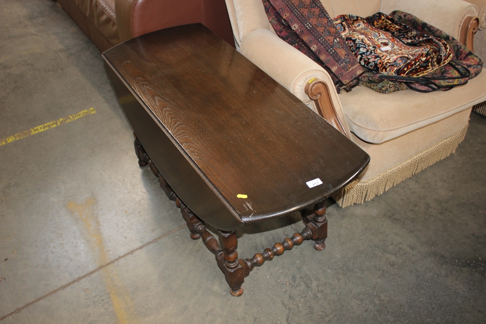 An Ercol drop leaf table