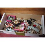 A box of various costume jewellery