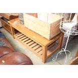 An oak veneered two tier coffee table