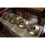 Four Eastern brass bells