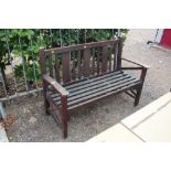 A teak garden bench