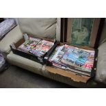 Two boxes of various magazines