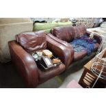 A John Lewis leather two seater sofa and matching