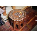 An Eastern and inlaid octagonal topped table